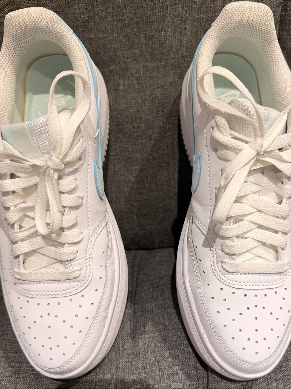Nike Women's White Sneakers with Light Blue Swoosh used like new